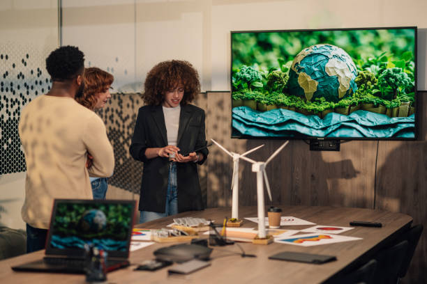 istock Diverse staff at eco friendly workspace and working on sustainability. 2170844697