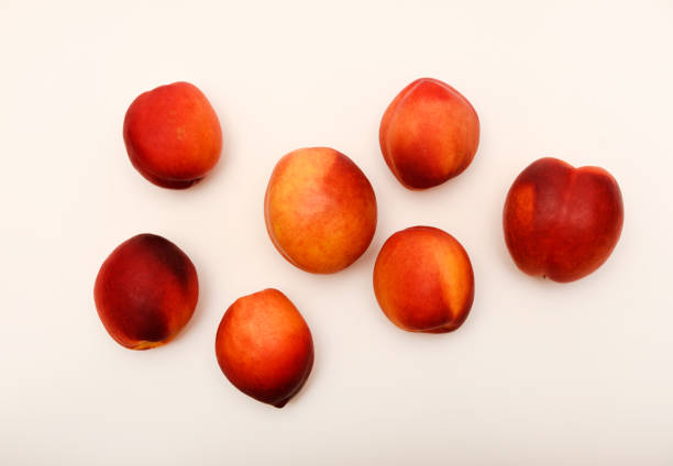 expositions of healthy fruits. peaches and plums