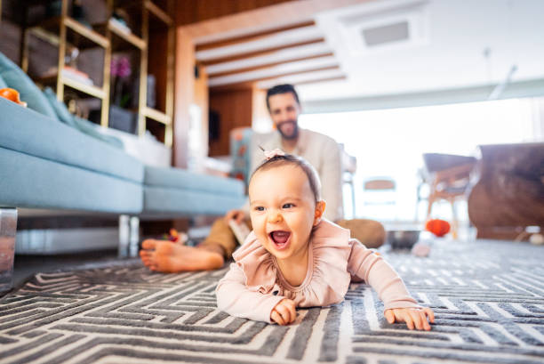 istock Baby girl playing at home 2170846612