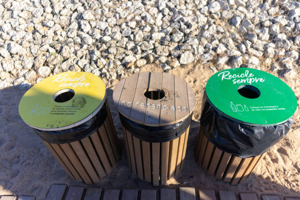 istock Recycling bins standing on a beach in Portugal. 2170847429