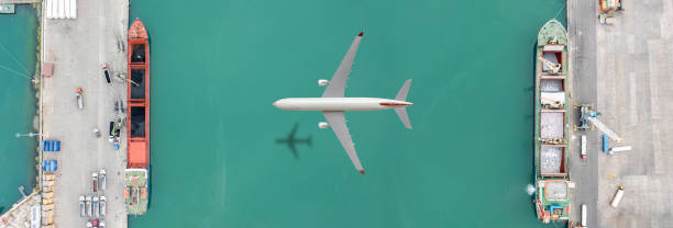 Cargo Airplane flying above international port.