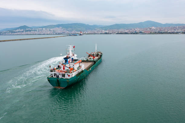 istock Aerial view of general cargo ship approaching port. 2170848120