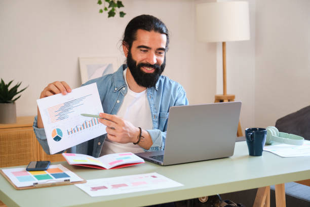 istock Marketing expert analyzing charts and graphs on laptop during video call 2170850398