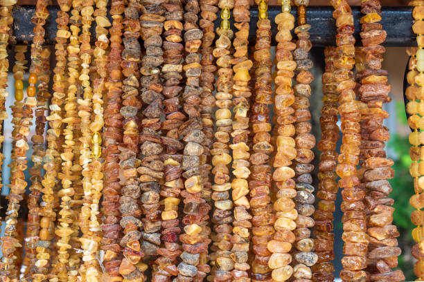 istock Yellow beads made of natural amber. 2170850743