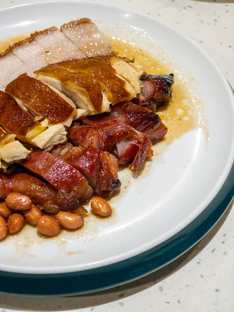 istock Cantonese roasted meat platter on a dinner plate 2170850763
