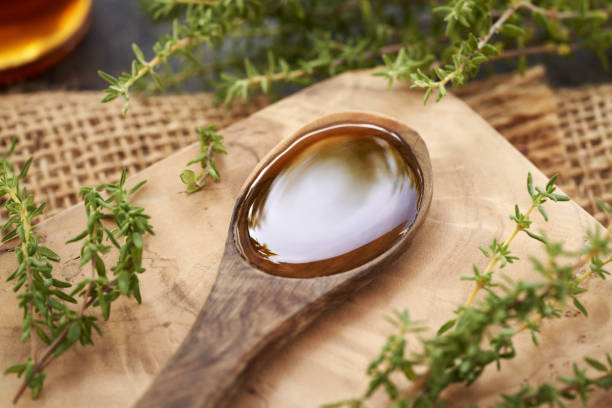 istock Homemade thyme syrup on a spoon 2170850990