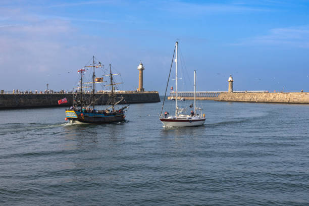 istock Boats and Lighthouses in Whitby Harbour 2170851795