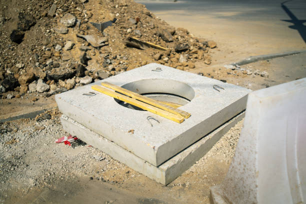 concrete slab features a central circular opening designed for underground well installations, symbolizing modern infrastructure's blend of functionality and durability