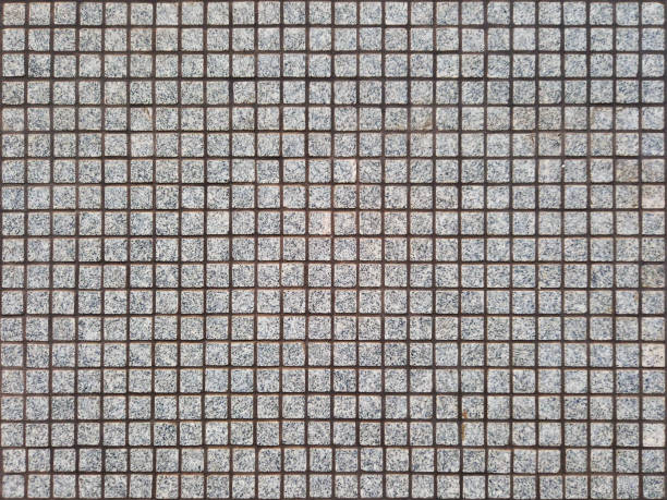 istock Square mosaic tile background. Small gray mosaic wall. Mosaic texture. Architecture and construction 2170853957