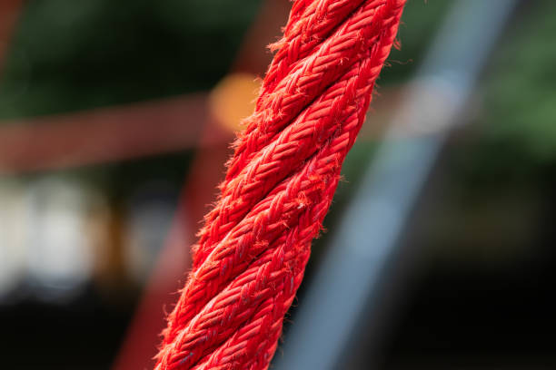 istock strained rope red thread macro view vivid colors with blurred background 2170858738