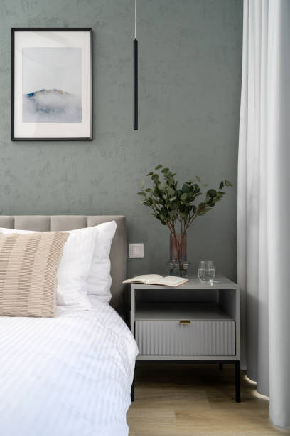 istock Comfort bed, bedside table and home decor in bedroom 2170859770