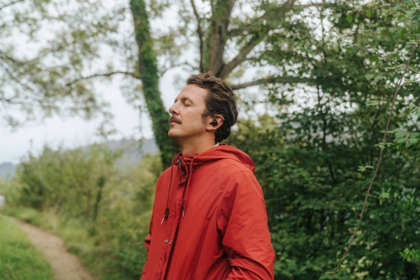 istock Relaxed man meditating in nature 2170863330