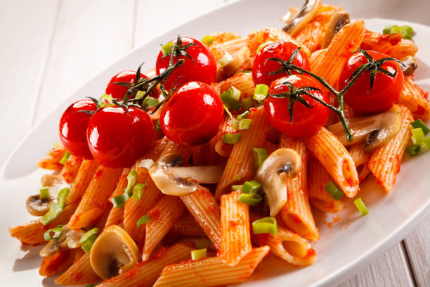 istock Penne with meat, tomato sauce and vegetables 2170863663
