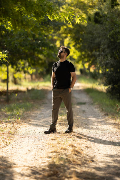 istock Relaxed man spending time outdoors. 2170864367