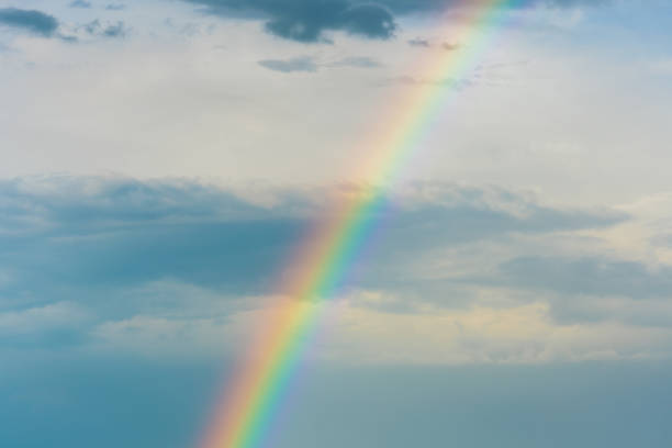 istock Colorful rainbow in the evening sky after rain 2170865946