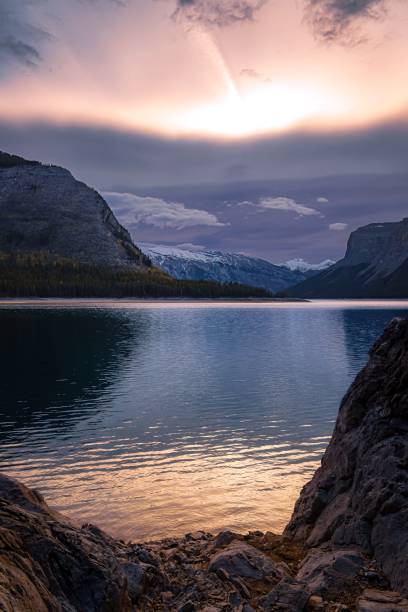 istock Sunrise Clouds Lighting Up Lake Minnewanka 2170870375