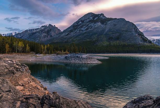 istock Cloudy Sunrise At Lake Minnewanka 2170870384
