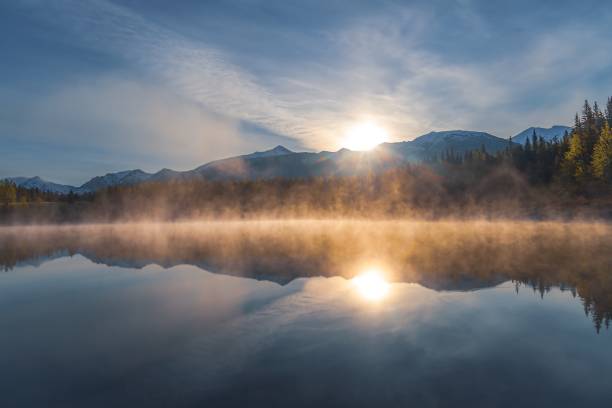 istock Sunny Sky Reflecting Over Mountains At Wedge Pond 2170871057