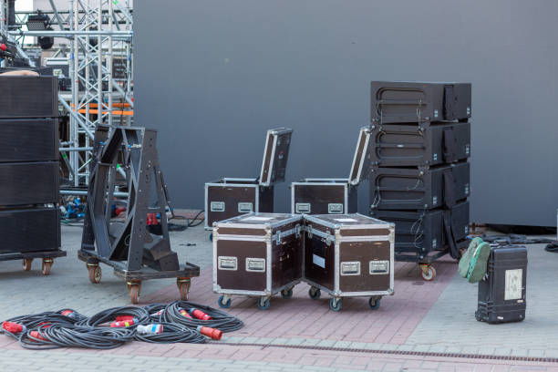 Stage equipment before the concert. Boxes with concert equipment: speakers, lighting, amplifiers, LED panels and cables.