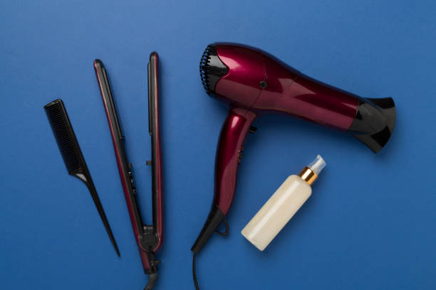 istock Hair tools with thermo protection on color background, top, view 2170872658