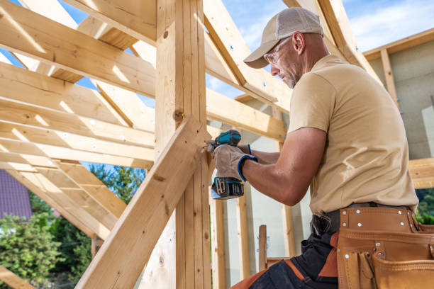 istock Skilled Carpenter at Work Constructing a Wooden Roof Frame in a Residential Home During Daylight 2170874638