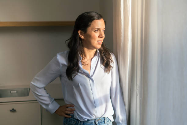 istock Woman contemplating at home 2170874841