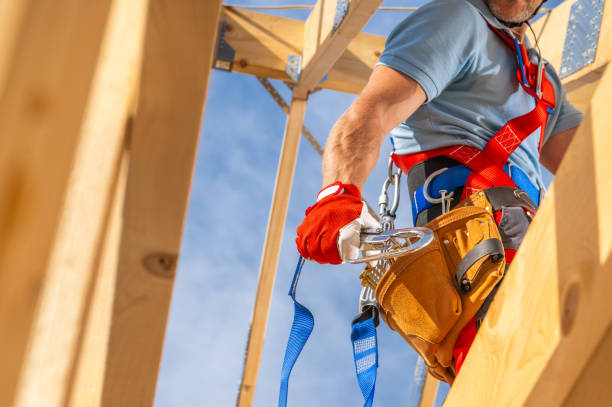 istock Construction Worker Preparing Safety Harness at a Building Site on a Sunny Day 2170875621