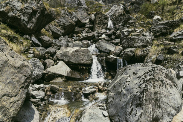 Mountain river cascading over granite river rocks, showing motion.Taken in Yosemite National Park, California, USA