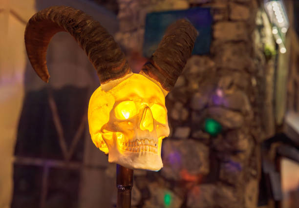 Eerie, glowing, illuminated skull with horns, gothic, Halloween decoration concept