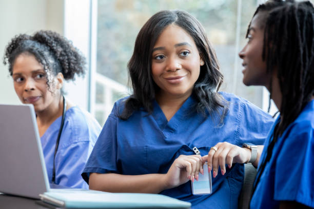istock Several students in the medical field, all female, participate in classroom discussions during their classes. 2170885044