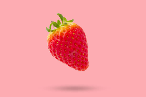 istock Strawberry floated on pink background close up 2170885068