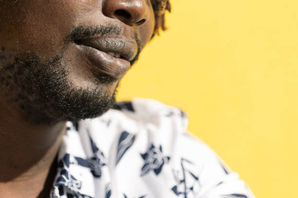 istock close-up of a young black man's mouth and lips 2170885998