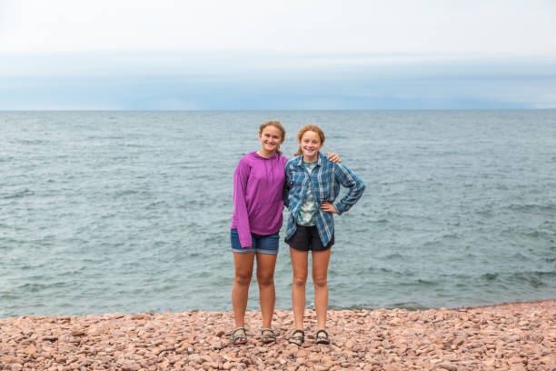 istock Sisters Standing on Shore of Lake Superior 2170892131