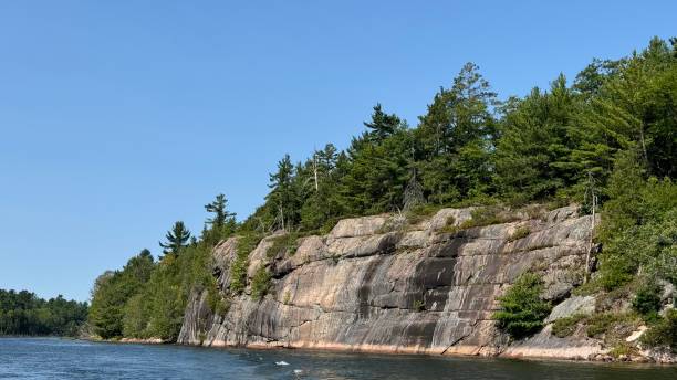 istock Pink Granite cliffs in Collins Inlet fiord near Killarney Ontario 2170894621