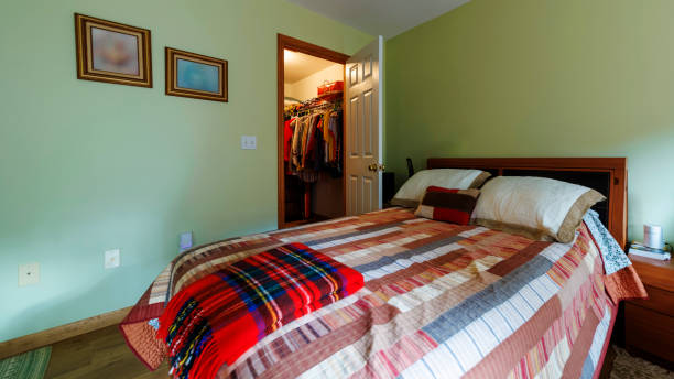 istock Restful retreat in Poconos dwelling. Queen-sized bed and walk-in closet offer middle-class comfort. 2170903482