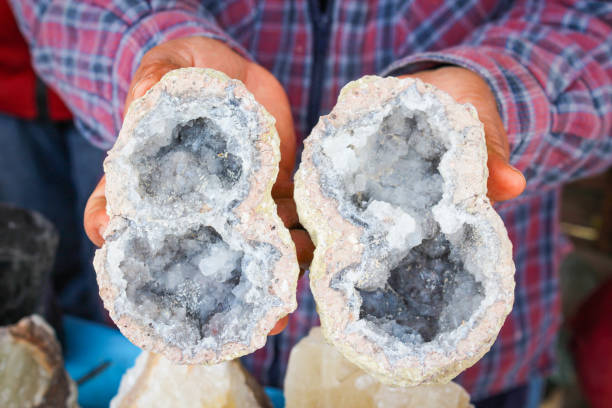 Quartz geode, miner's hands in Queretaro