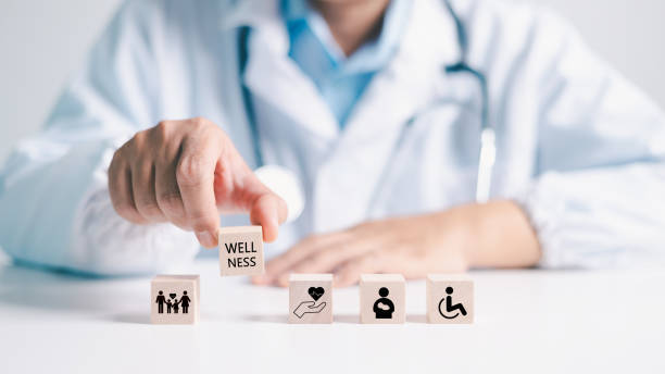 istock Employee wellness programs often include mental health support, medical insurance and disease prevention to ensure well-being of families and individuals, symbolizing commitment to overall health. 2170905850