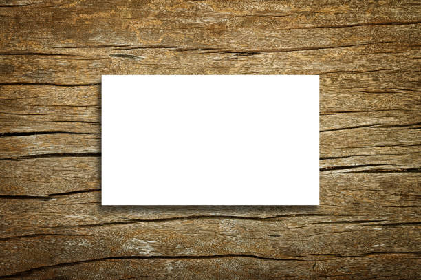 White bussiness card on vintage wood texture background