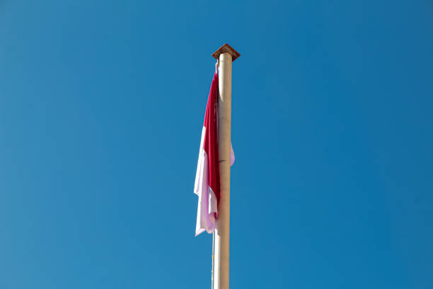 Indonesia's white flag flies on the flagpole