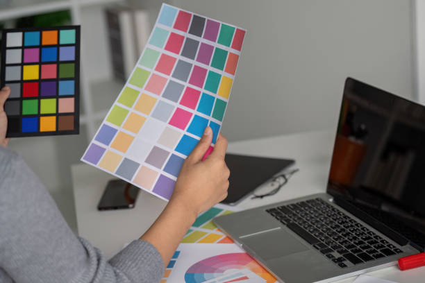 istock Graphic designer reviewing color palette for creative project 2170908841