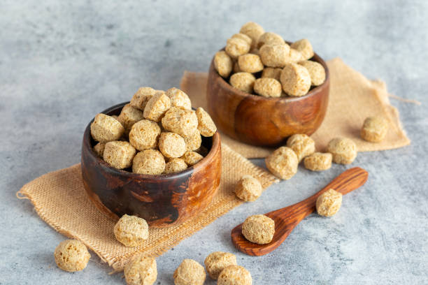 istock Raw soya chunks are dehydrated, protein-rich, plant-based meat substitutes made from defatted soy flour, commonly used in vegetarian dishes. 2170910356