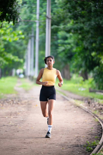istock Female runner in a park 2170910828