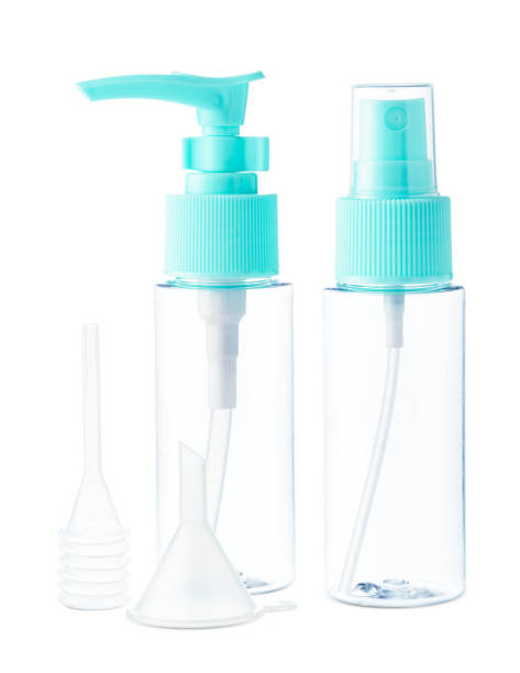 istock Clear plastic bottles with blue pumps and spray tops arranged on a white background 2170913921