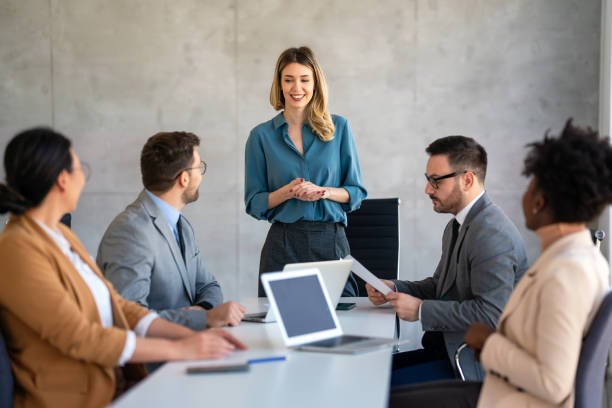 istock Successful multiethnic business people presenting analytical report while working together in office 2170913985
