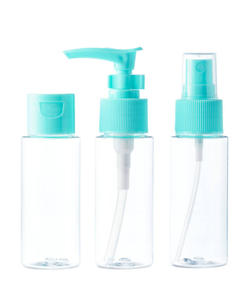 istock Clear plastic bottles with blue pumps and spray tops arranged on a white background 2170914150