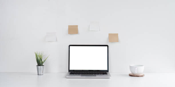 istock Simple Workspace with Laptop and Coffee Cup on Desk 2170915998