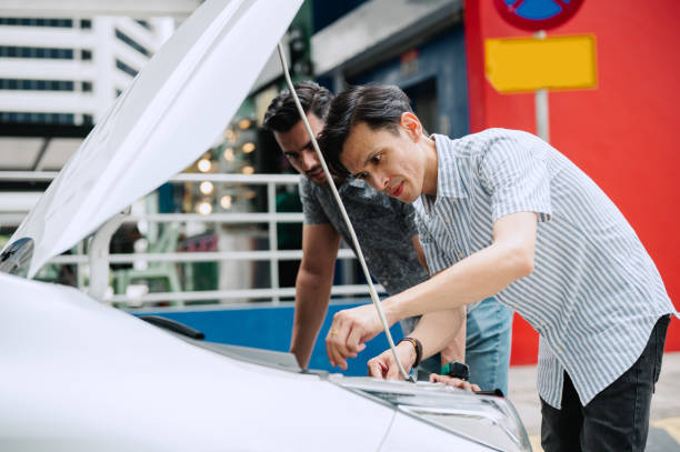 istock 2 Asian  traveler with car breakdown. 2170916816