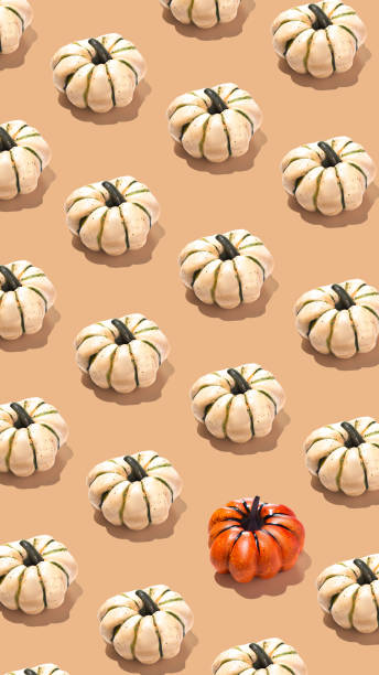 istock Pumpkins pattern creative on beige background vertical banner minimal, white and orange pumpkins 2170917707