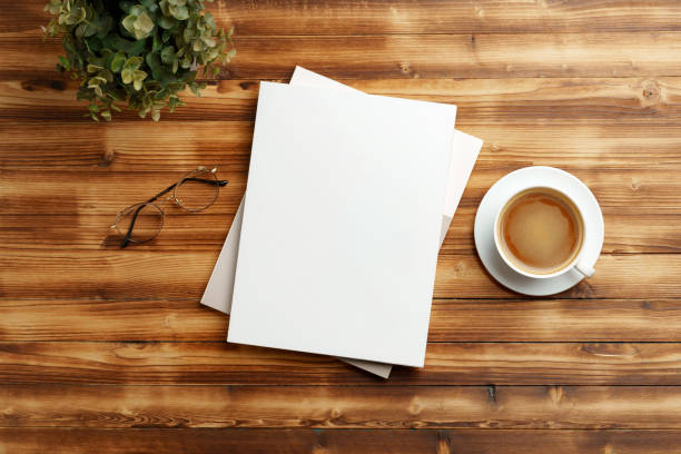istock A Blank Notepad Resting on a Wooden Table in Natural Light During Daytime 2170918461