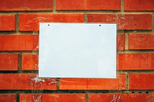 istock Blank white notice paper mockup on the brick wall 2170920651